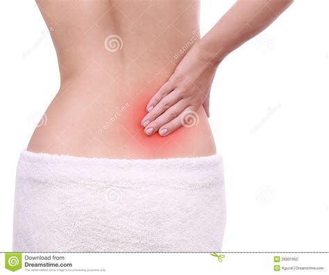 Do you know what the proven root cause of most back pain is? Young Woman With Pain In Her Lower Back Stock Photo ...