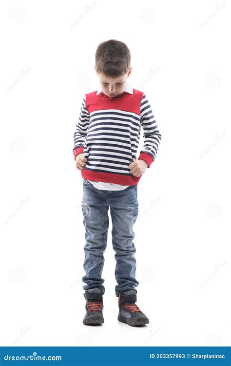 Sad Disappointed Little Kid With Bowed Head Looking Down And