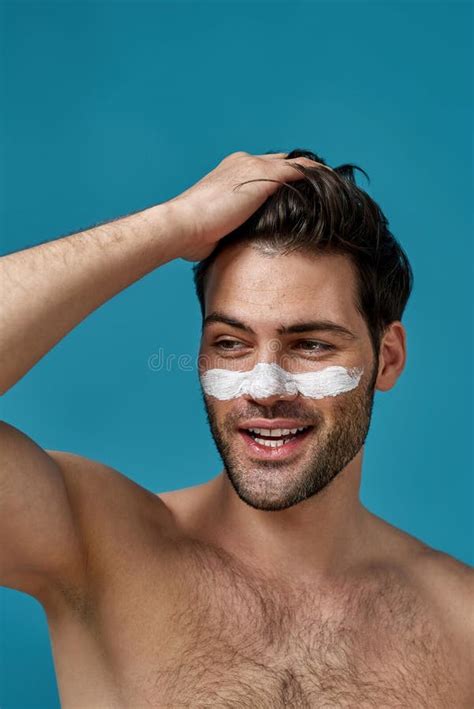 Shirtless Guy With White Mask Applied On Nose For Cleansing Pores