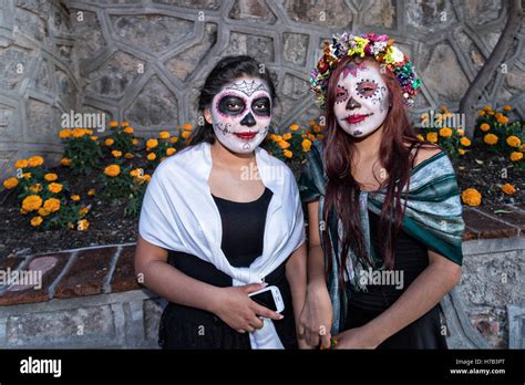 Young Women Dressed As La Calavera Catrina During The Final Day Of The