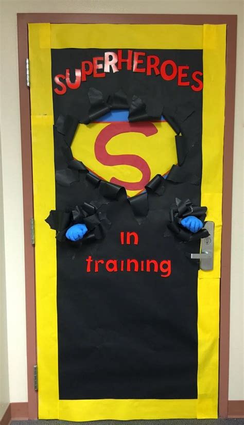 The party was based on the avengers theme and includes free printables. Door displays | Superhero classroom theme, Superhero ...