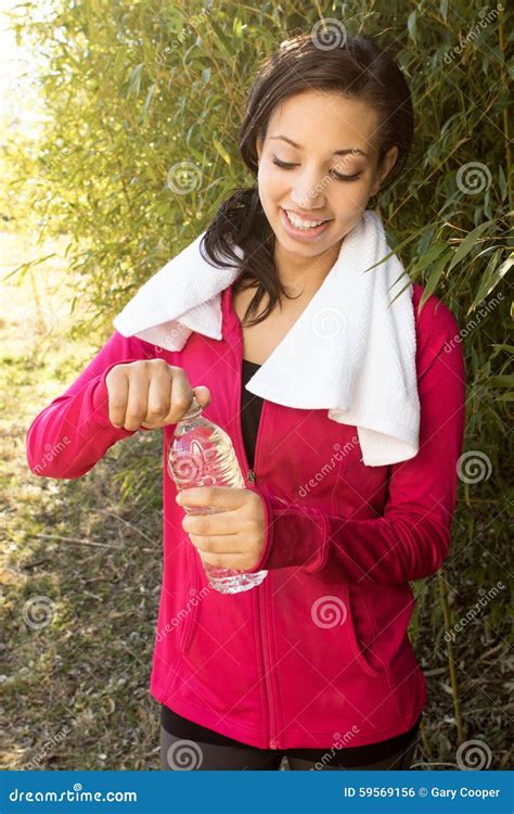 Woman Drinking Water After Working Out Stock Photo Image Of Looking