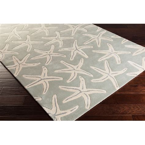 Add Interest To Your Decor With This Coastal Inspired Rug Hand Tufted