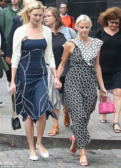 Karlie Kloss Looks Elegant In Nature Inspired Blue Dress While Holding Hands With Sister