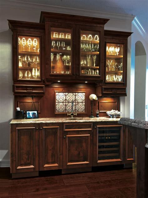 Traditional Cabinetry In A Rich Brown Tone Lends Elegance And Warmth To