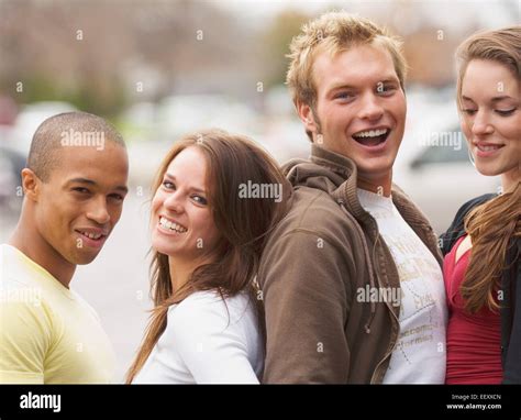 Two Couples Posing Together Outdoors Stock Photo Alamy