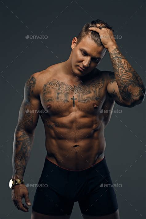 Portrait Of Muscular Tattooed Shirtless Male Stock Photo By Fxquadro