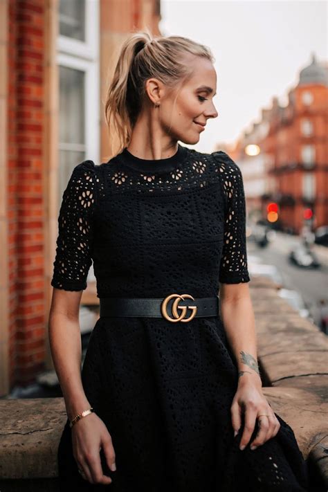 Blonde Women Wearing Black Lace Dress With Gucci Belt On London Balcony