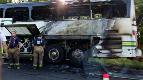 Fire Leaves Back Of Tour Bus Fully Engulfed In Flames