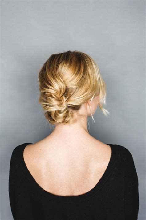Waves grazing her collarbone styled as: Holiday Hair Tutorial: An Easy Short Hair Updo - Anne Sage