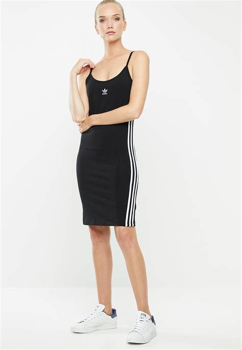 Regular fit is wider at the body, with a straight silhouette. Adicolour tank dress - black adidas Originals T-Shirts ...