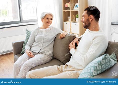 Senior Mother Talking To Adult Son At Home Stock Image Image Of Person Couch 152821929