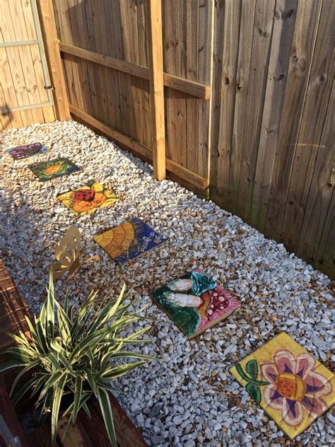 Stepping stones are essential to the garden because they are not only functional so that you won't step on the grass but also can be used to decorate your garden. Hand painted stepping stones(Spring time theme) | Painted ...