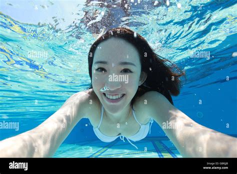 Beautiful Young Women Under The Water Stock Photo Alamy