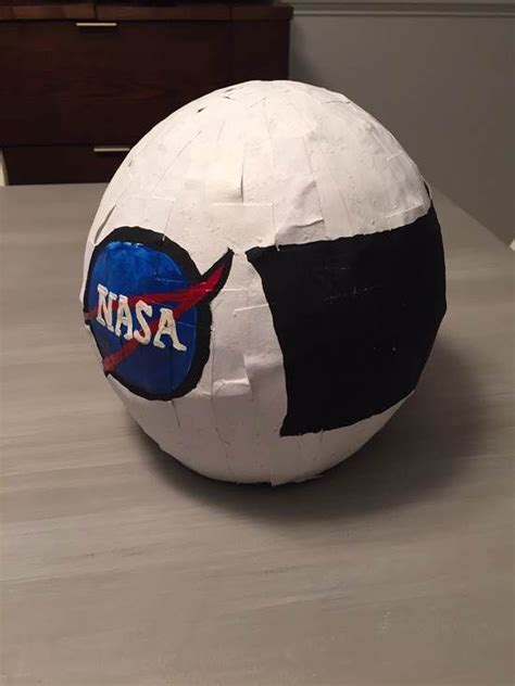 The helmet is made out of paper mache over a balloon then cut. 24 DIY Space Helmet Projects That You Can Make For Halloween Or Cosplay | Astronaut helmet, Diy ...