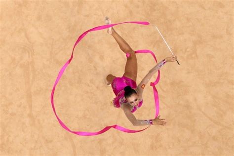 Daria Dmitrieva Of Russia Competes With The Ribbon During The