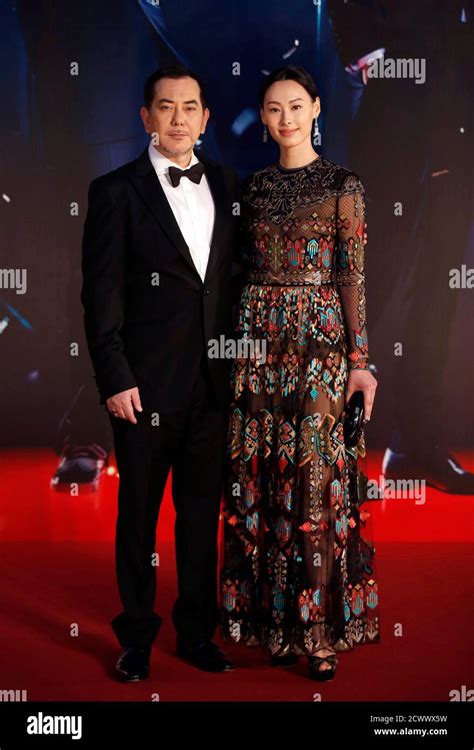 Hong Kong Actress Isabella Leong And Actor Anthony Wong Pose On The Red
