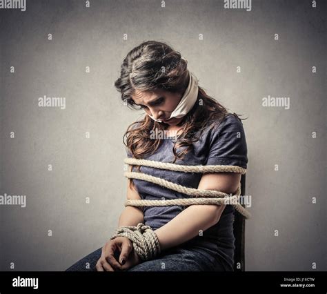 Woman Being Tied Down With Ropes Stock Photo Alamy
