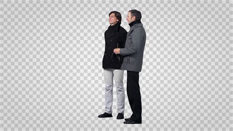 Two Men Standing And Looking For Something Back View Footage With