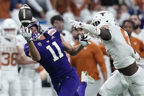 No. 12 Washington holds off No. 21 Texas 27-20 in Alamo Bowl - The