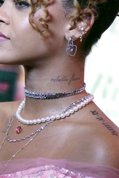 Rihanna S Tattoos Everything To Know About All Her Ink On Her Body Hollywood Life