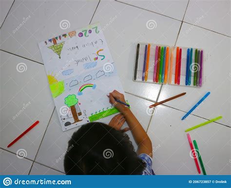 Child Drawing With Crayons At The Color Book Stock Image Image Of