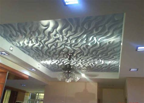 Modern gypsum wall pop design: 7 Cool Ways to use False Ceiling Designs in Hall - DecorChamp