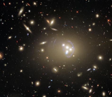Our Giant Universe Hubble Spots Massive Galaxy Cluster With A Wealth