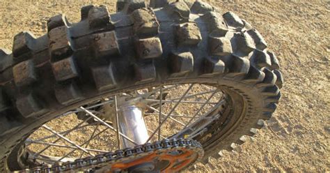 Red dirt bike motorcycle tire installation assistance tool new enduro. ﻿Choosing Types of Dirt Bike Tires for MX Motocross Races ...