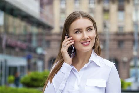 Happy Business Woman In White Shirt Calling By Phone Stock Image Everypixel
