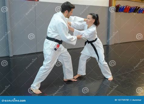 Woman And Man Judo Fighters In Sport Hall Stock Image Image Of