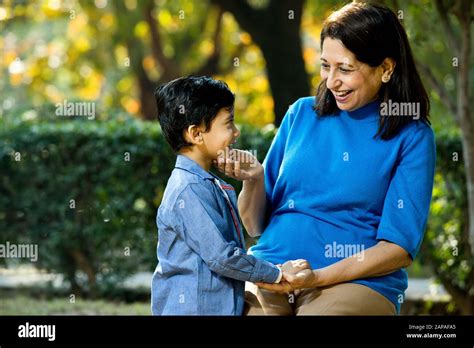 Loving Grandmother Playing With Her Grandson At Park Stock Photo Alamy