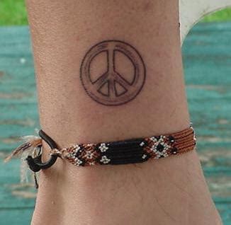 The neat thing about having this tattoo on your wrist is when you go to give someone the peace sign with your fingers, the image of the peace sign will be visible as well. Best Tattoos For Men: Peace Sign Tattoos
