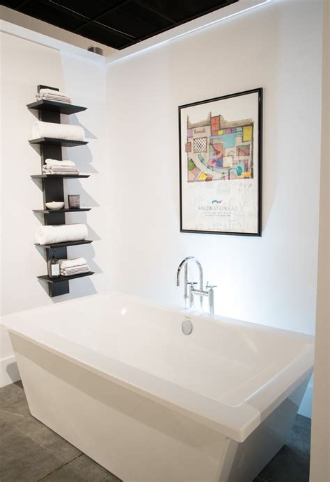 Most tubs also have an overflow hole in the bathtub wall approximately 12 to 14 inches above the drain hole. R. Jacobs Fine Plumbing & Hardware Showroom! | Plumbing ...