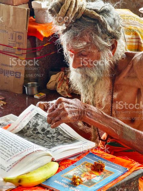 Old Age Indian Sadhu Reading Holy Scriptures In Ganagapura Karnataka