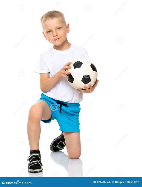 Little Boy Is Playing With A Soccer Ball Stock Image Image Of Little