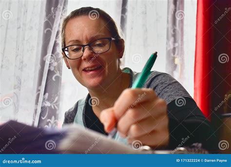 A Mature Student Hard At Work Studying From Home Stock Photo Image Of Certified University