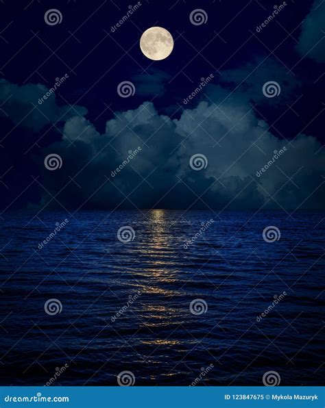 Full Moon Over Clouds And Dark Water Stock Image Image Of Blue