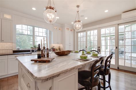 This Bright White Kitchen Features A Mont Blanc Honed Quartzite Island