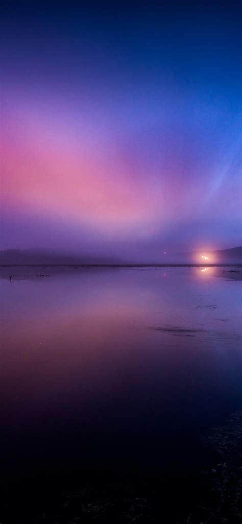 Download Wallpaper 1125x2436 Sunset Reflections Nature Blue Pink Sky