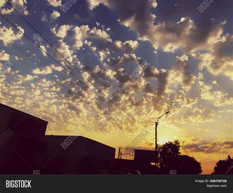 Sunset Cloudy Sky Image And Photo Free Trial Bigstock