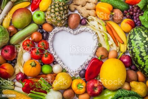 Fruits And Vegetables Large Assortment With White Heart Shape Overhead