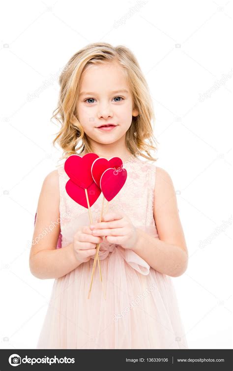Girl Holding Red Hearts — Stock Photo © Igortishenko 136339106