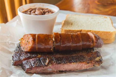 Bbq ribs slowly smoked with hickory then smothered with our bbq sauce. ribs-and-sausage-at-opies-spicewood | That's What She Had