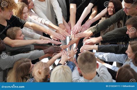 Group Of Diverse People Joining Their Hands In A Circle Stock Image