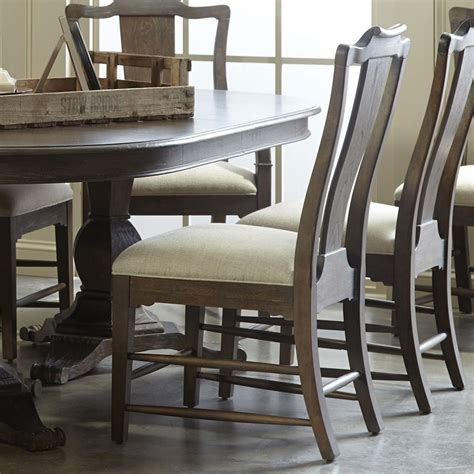 Historically the dining room is furnished with a rather large dining table and several dining chairs. Saint Germain Round Dining Room Set ART Furniture ...