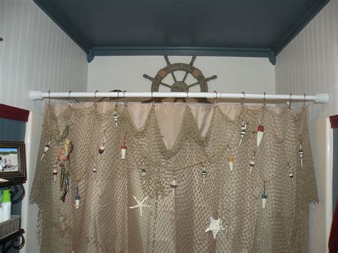 Get into the holiday spirit with these decorating. I hung a decorative fishing net with wooden fish and real ...