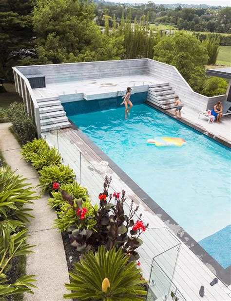 This Tropical Inspired Pool Has The Ultimate Diving Platform Swimming