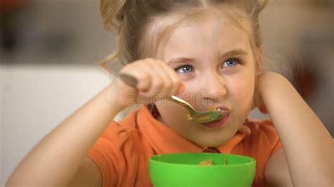 Little Girl Eating Cereal Stock Photo Image Of People 16123888
