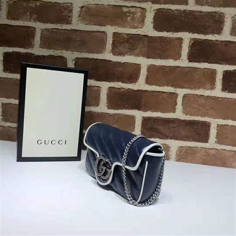 Gucci Gg Women Gg Marmont Super Mini Bag In Blue Diagonal Matelassé